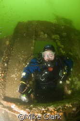 Diver exits Unity wreck.
Moray Firth 
Scotland
nikon d... by Mike Clark 